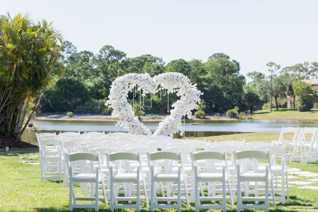 Palm Beach Wedding Venue, bridesmaids dresses and luxury flowers at an outdoor wedding ceremony